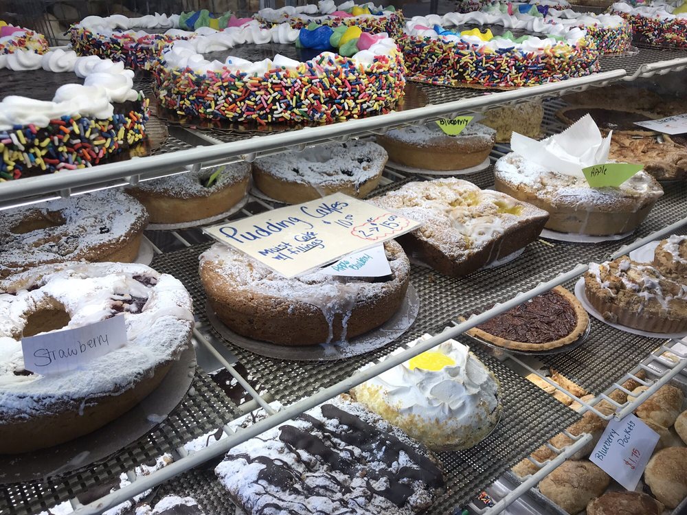 Packanack Bakery display case filled with cakes, pies and pastries